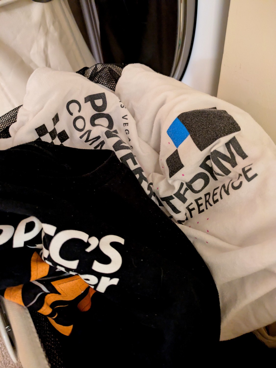 A pile of clothes in a washing machine AI-generated content may be
incorrect.