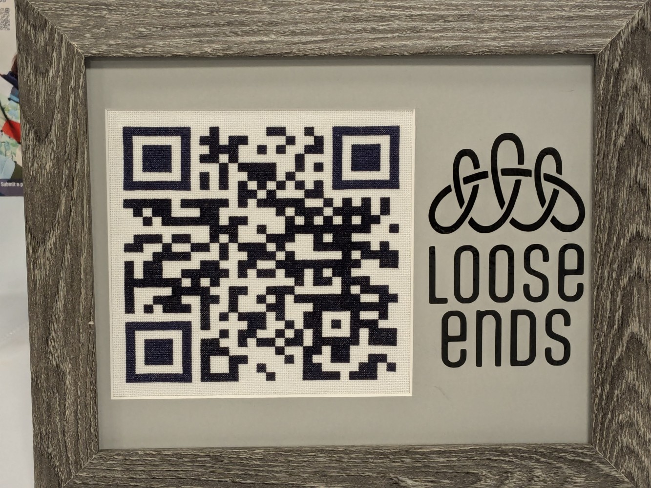 A qr code in a frame Description automatically
generated